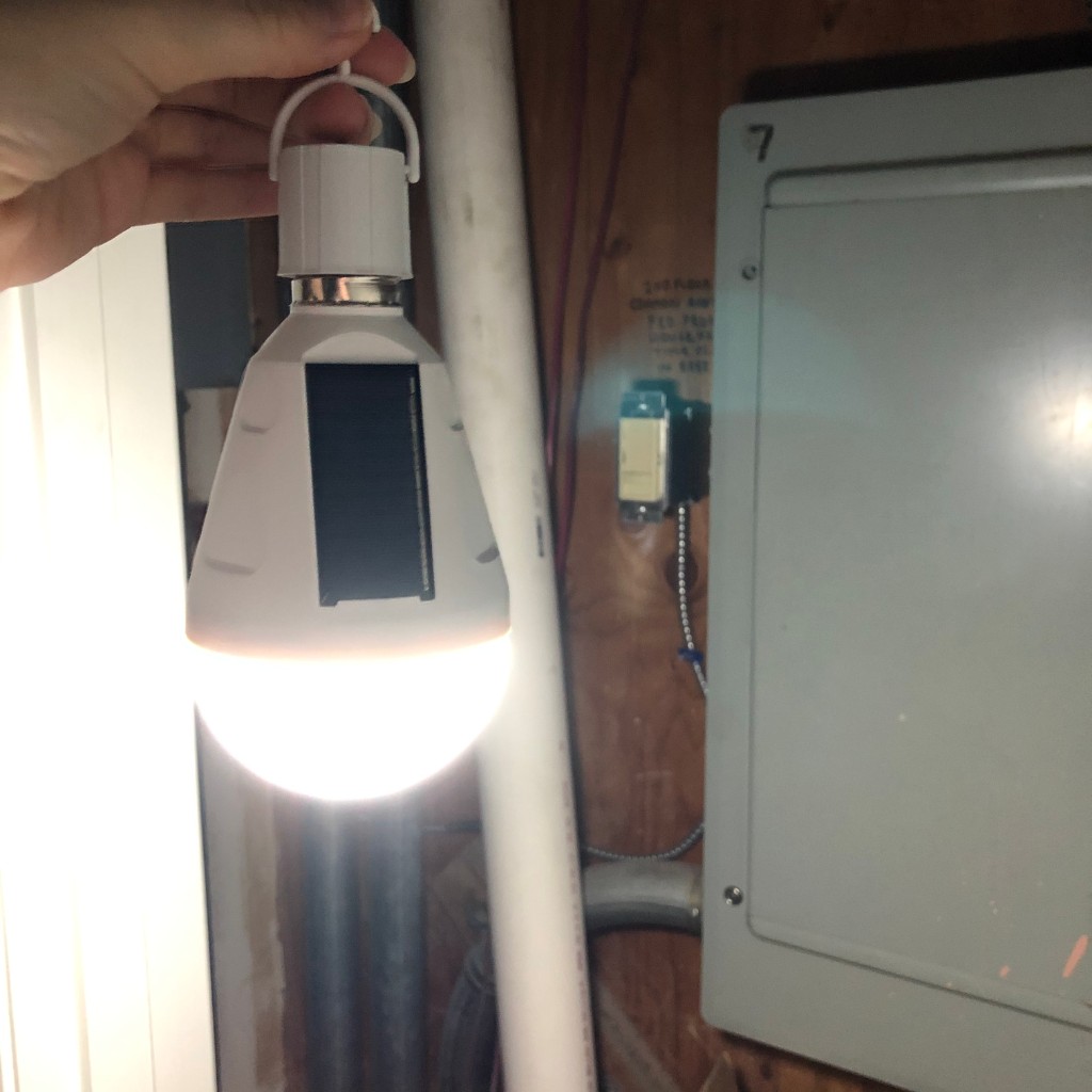 Eternalight bulb glowing next to breaker panel